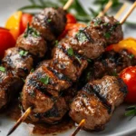 Grilled Chicken Hearts on Skewers First Image First Image
