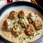 Mistletoe Meatballs in Creamy Pan Sauce First Image First Image