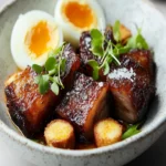 Crispy Pork Belly with Hard-Boiled Egg "Croutons" First Image First Image