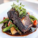 Cacao-Rubbed Short Rib Confit First Image First Image